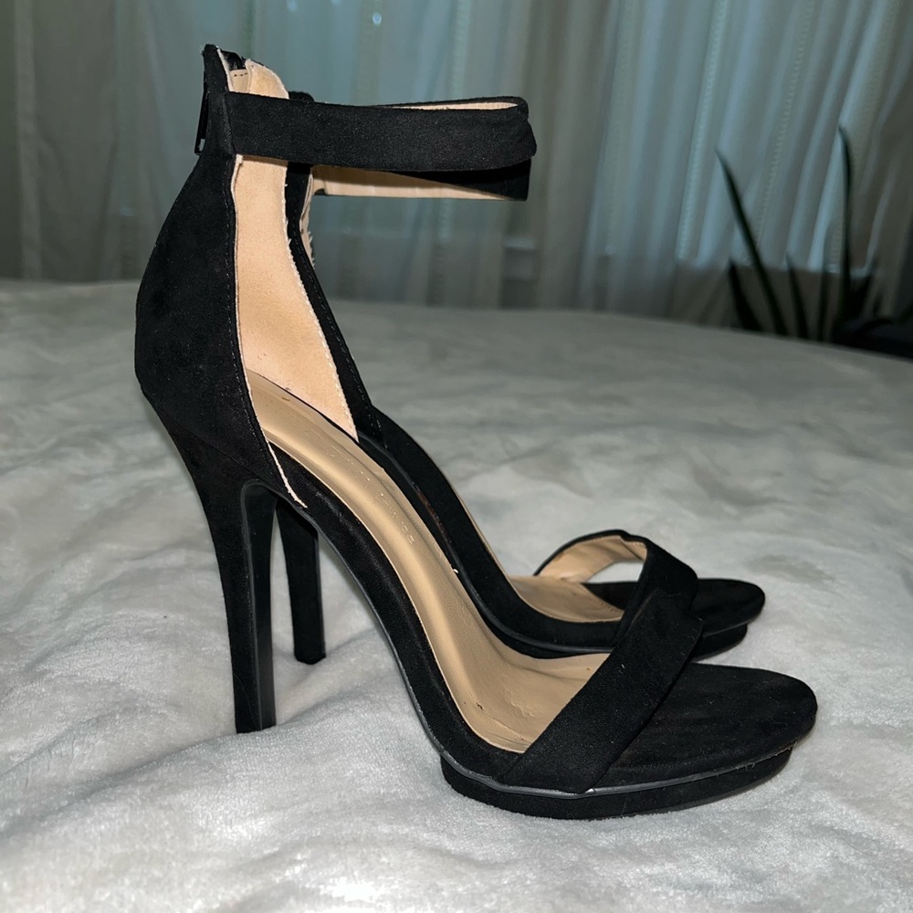 Single strap black heels